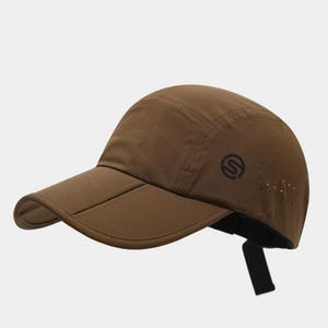 Detail of a brown quick-dry outdoor cap showing laser-cut vents and foldable brim design