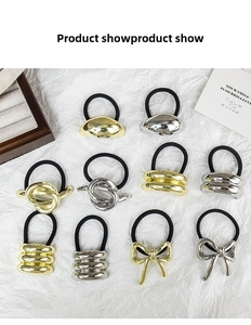Close-up of 10-piece metal elastic hair ties in gold and silver with various geometric shapes