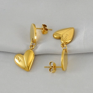 Elegant gold heart drop earrings in stainless steel with LOVE engraving for women