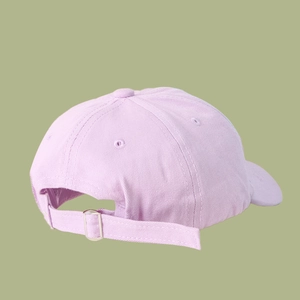 Detail of light purple cotton baseball cap with adjustable metal buckle and strap back