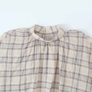 Women plaid crop top shirt with high neckline and layered ruffle detail in brown check