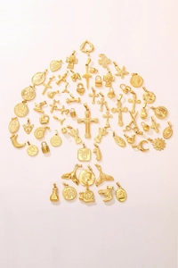 Detailed arrangement of 18K gold plated stainless steel pendants in diverse shapes