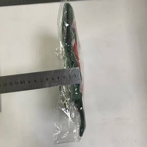 Detail showing the 3cm thickness of the fabric Christmas stocking in its packaging