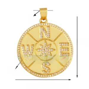 Spécifications du pendentif boussole doré de 30mm avec gravures des points cardinaux