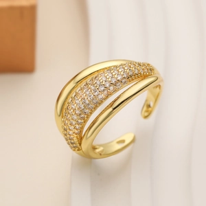 Macro view of 18K gold plated multi-layer geometric ring with sparkling zircon inlays
