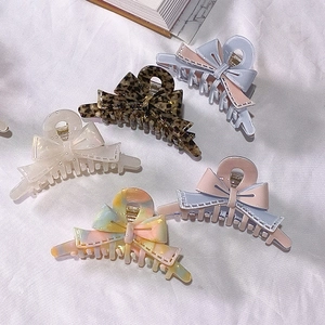 Set of five elegant acetate bow hair claws in tortoiseshell and pastel gradient finishes