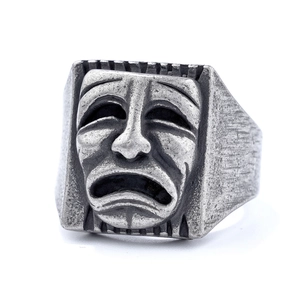 Vintage punk tragic mask ring in distressed silver finish with drama face relief