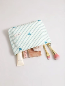 Blue striped makeup bag with bow embroidery and large capacity for skincare storage