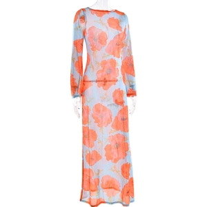 Detail of sheer long sleeve dress featuring vibrant orange floral prints on light blue fabric