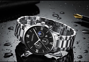 Close-up of silver Geneva business watch with black dial on a dark water-dropped surface