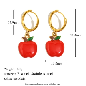 Detailed view of 18K gold plated stainless steel apple earrings with red enamel charms