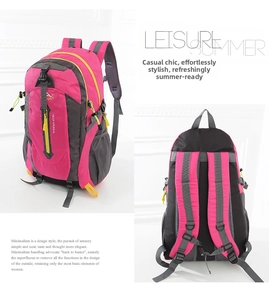 Macro detail of ergonomic padded shoulder straps and breathable back design on rose red backpack