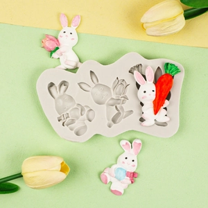 Three-cavity 3D rabbit silicone mold showing finished bunnies with eggs and carrots