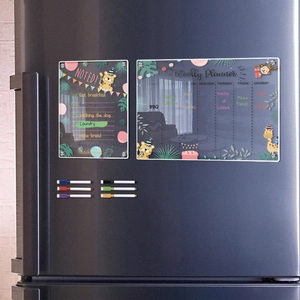 Detail of magnetic weekly planner and to-do list with animal design on grey fridge
