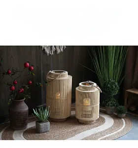 Close-up of two handmade bamboo lanterns with hemp handles for zen home decoration