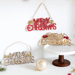 Three wooden Merry Christmas hanging ornaments with red stars and natural jute twine