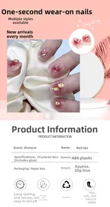Macro view of gradient pink press-on nails set with aurora crystal rhinestones