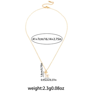 Detail showing dimensions of gold-tone reindeer pendant necklace with tiny zircons