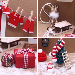Miniature Christmas dollhouse set with wooden sled, ladder, and cozy knitted accessories