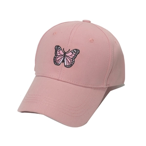 Pink cotton baseball cap with embroidered butterfly and curved brim for outdoor sun protection