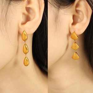 Elegant gold drop earrings with layered shell and teardrop design for women