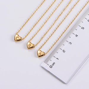 18K gold-plated heart pendant necklace with letters A B C on a white background