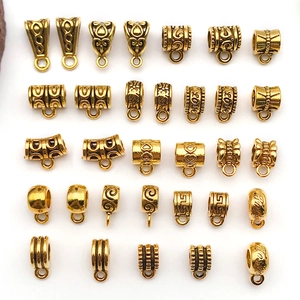 Collezione di ganci per ciondoli e connettori dorati in lega per collane e bracciali DIY