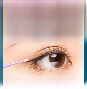 Macro detail of purple micro brushes used for precise eyelash extension and permanent makeup