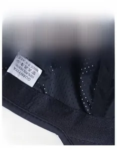 Detail of moisture-wicking sweatband and perforated mesh lining on the sports cap