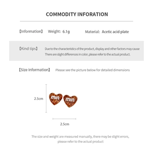 Detail specifications of heart acetate earrings showing size 2.5cm and 6.1g weight