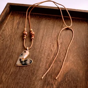 Bohemian marble resin heart pendant necklace with brown leather cord and leopard beads