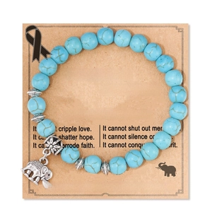 Turquoise beads bracelet with silver elephant charm displayed on kraft card with message