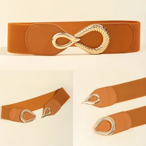 Detail of caramel elastic waist belt with golden twisted water-drop metal buckle closure