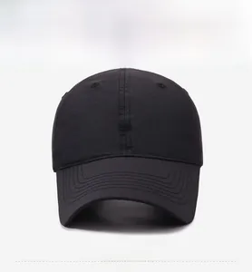 Front view of solid black minimalist baseball cap with reinforced stitched brim detail