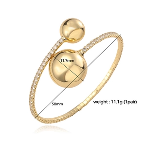 Gold plated heart bead open bangle with sparkling cubic zirconia stones and metal balls