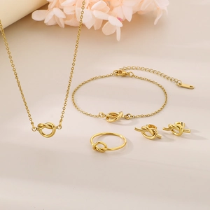 Minimalist 18K gold plated knotted jewelry set with necklace, bracelet, ring and earrings