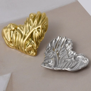 Minimalist 304 stainless steel heart earrings with 18k gold textured lava finish