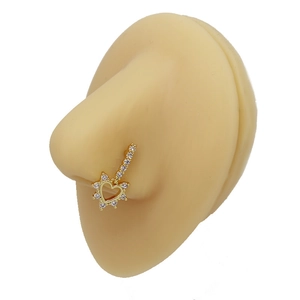 Golden heart nose stud with white zircon pavé shown on a silicone model nose