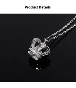 Macro shot of crown pendant in S925 sterling silver with sparkling pave-set diamonds
