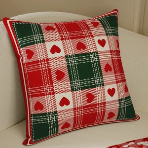 Christmas red plaid pillow cover with heart pattern on sofa for festive home decor