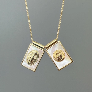 Double rectangular shell pendant necklace with golden virgin Mary and sacred heart motifs