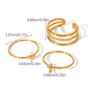 Detailed size chart showing dimensions of gold stainless steel rings with cross and heart