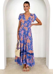 Close-up of bohemian blue floral maxi dress with V-neck and button detailing