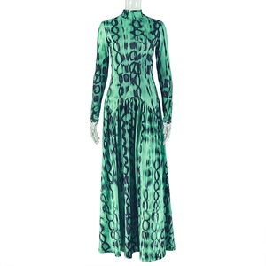 Detail of high neck long sleeve dress with green and black abstract pattern