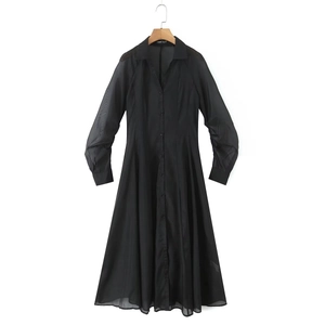 Elegant black V-neck shirt dress featuring sheer texture sleeves and button details