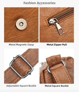 Détails des fermetures éclair en argent et des boucles réglables sur le sac en cuir marron