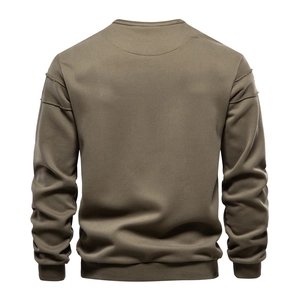 Back view of brown crewneck sweatshirt featuring ribbed cuffs and detailed shoulder stitching
