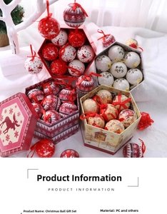 Close-up of decorative Christmas baubles with reindeer patterns and holiday greetings