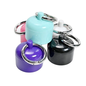 Portable mini jewelry storage boxes in 5 colors with metal ring hooks on white background