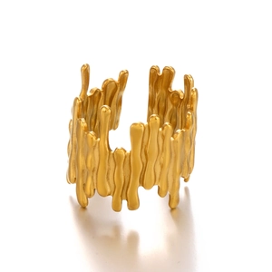 Artistic liquid metal style open ring in gold finish with irregular molten texture